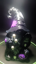 Load image into Gallery viewer, Black 3D printed scary garden gnome with skulls in its beard, a GO AWAY tombstone, and a purple jack-o'-lantern at its feet
